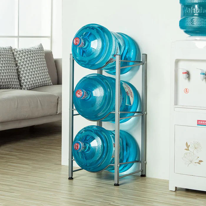 Water bottle holder rack is holding 3 five gallon water bottles